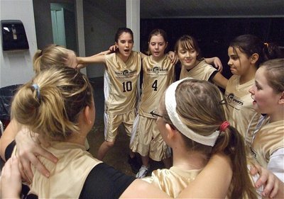 Image: Pump it up — Italy 24 sings their war chant in the locker room before taking the floor.