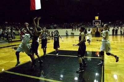 Image: Jameka drives in — Lady Gladiator Jameka Copeland(5) banks in a shot over a Grandview defender.