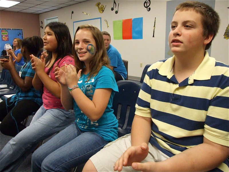 Image: Giving it their all! — The 6th grade band class continues to make the best music they can without actual instruments to play.