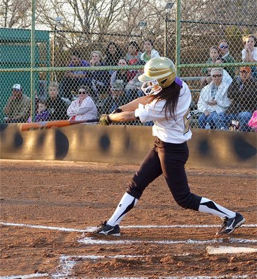 Image: A hit with fans — At her first at bat, lead-off batter Anna Viers(6) hits a lead-off single to lead the attack for the Lady Gladiators.