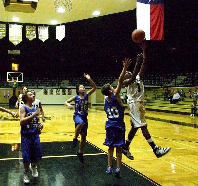 Image: Creating points — Italy’s Tony Wilson(1) scores two against the Chargers.