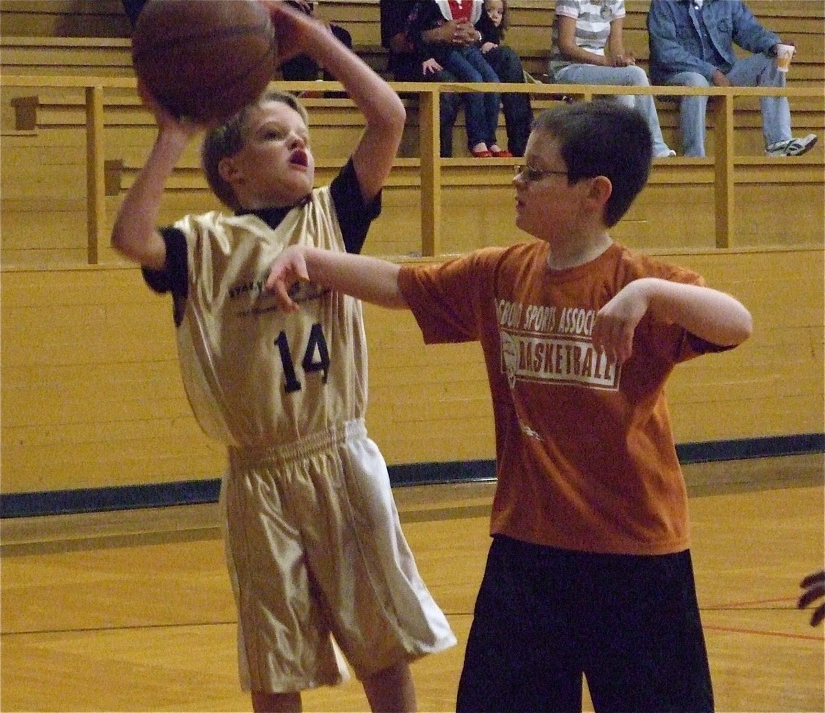 Image: Reese takes a shot — Reese Janek(14) scores 2-points in Italy 9’s win over Hillsboro orange.