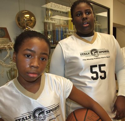Image: Quintera &amp; Cory — Quintera Washington(1) and Cory Chance(55) try to catch their breath after defeating Hillsboro Blue 30-8.
