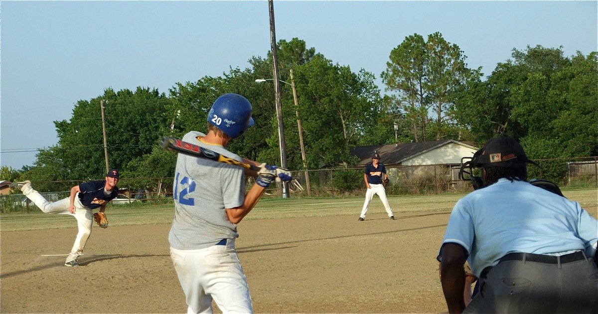 Image: Over the fence — Corsicana Tiger-Blue’s Jacob Peterson opens up on an inside pitch and sends it sailing over the left field fence for a 3-run homerun against Teague.