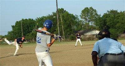 Image: Over the fence — Corsicana Tiger-Blue’s Jacob Peterson opens up on an inside pitch and sends it sailing over the left field fence for a 3-run homerun against Teague.