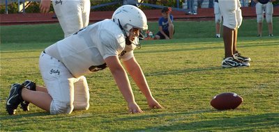 Image: Here, kitty, kitty! — Noseguard Kelton Bales(60) sets a trap for the Cougars.