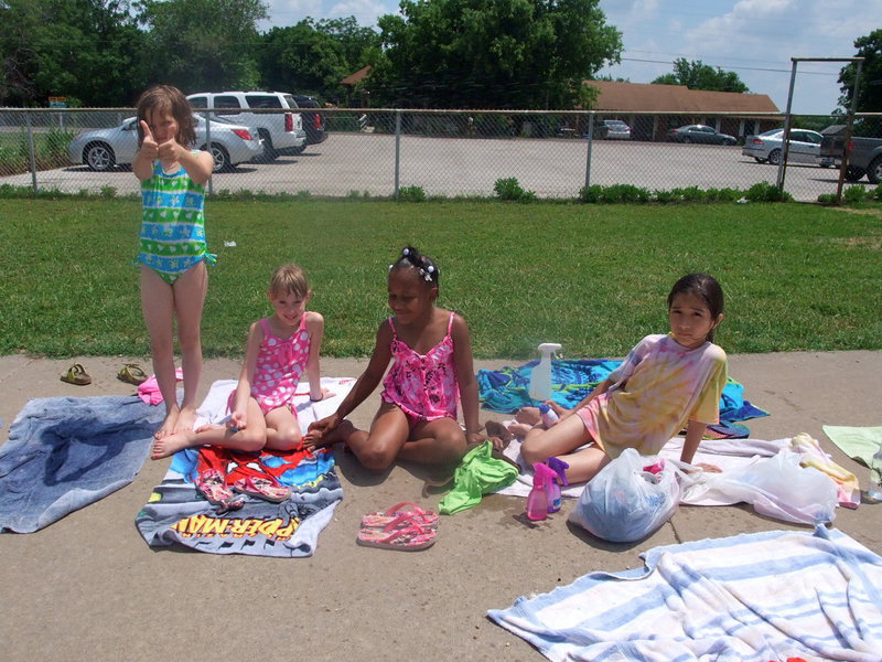 Image: Bathing Beauties — They are catching some rays.