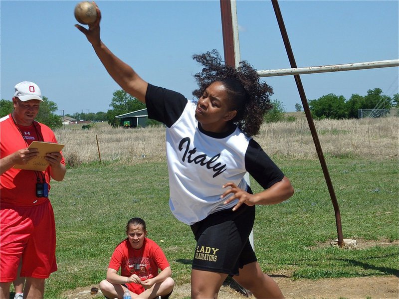Image: One last hoorah! — Senior Jaleecia Fleming launches the shot put to finish in 8th place.