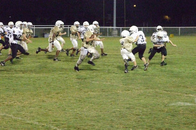 Image: Italy offense — Italy offense working hard for the touchdowns.