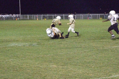 Image: Hubbard hangs on — Italy trying to break free.