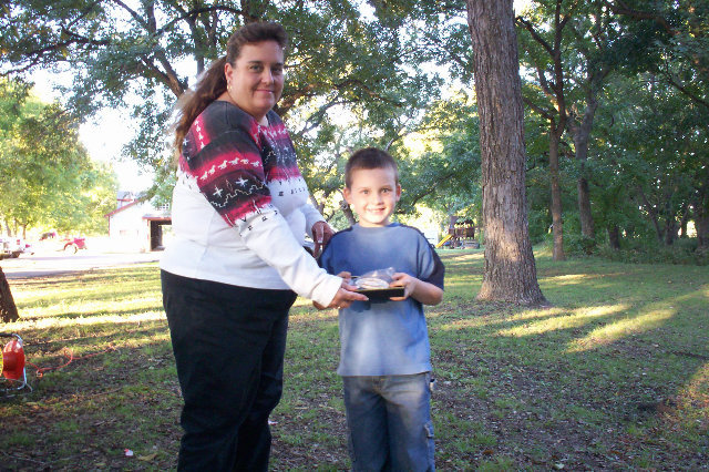 Image: Reserve Champion Buckle Winner — ECEA president Becky Hansen awards Hunter Hinz of Italy his reserve champion buckle for walk and whoa.