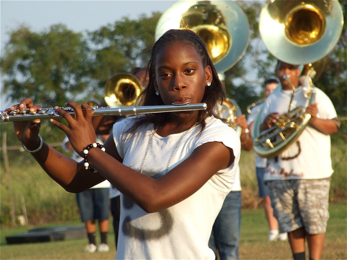 Image: Kortnei Johnson — Kortnei gets a little help from the tuba section.