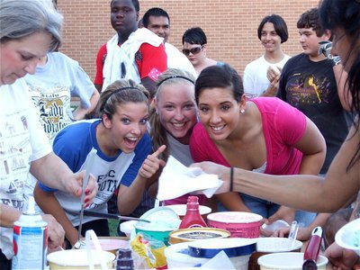 Image: The background girls — Morgan Cockerham, Jaclynn Lewis and Alyssa Richards are ready for their chance at the ice cream.