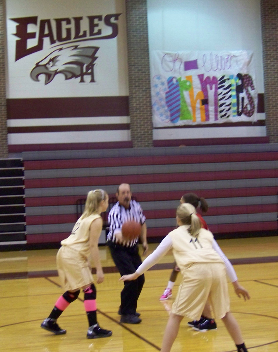 Image: Jac and Maddy Tip-Off — Italy 23 prepares to tip-off against Hillsboro Red at the Hillsboro Big Gym. The “Twin Towers” were unstoppable as #22 Jaclynn Lewis and #11 Madison Washington combined for 29 of Italy’s 54-points.