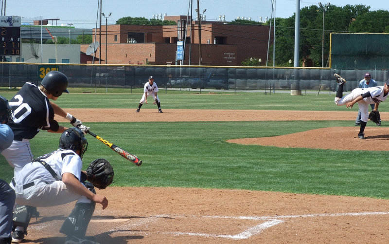 Image: Check it out — Colten Campbell cracks this one to the outfield. (Look at the ball directly in front of the bat.)