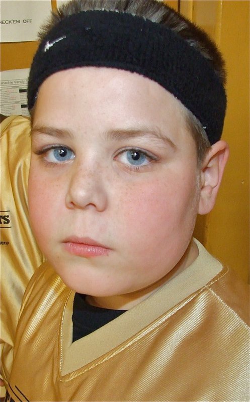 Image: Cade Roberts — Sharp shooter Cade Roberts(12) uses his eagle-like vision to spot the rim and put up shots.