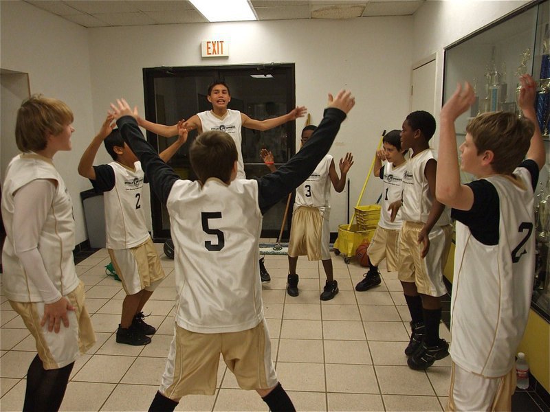 Image: Jumping for joy — Italy 31 stretches it out before the game and then pulls out an upset win against Italy 29 in the Tuesday night finale. Italy 31 came from behind to win 46-42 in one of the most exciting IYAA games ever played at the old Italy gym.