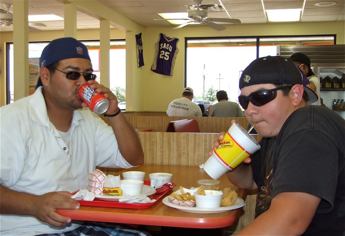 Image: Ready for Florida — Sporting their beach wear, IHS Band director Jesus perez and percussionist Kevin Roldan are ready to rock Florida over spring break.