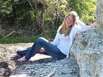 Image: Under the sun — Taylor takes a moment to relax under the sun before the pageant.