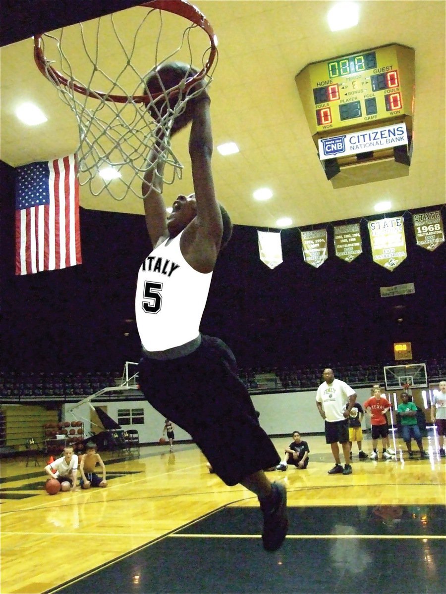 Image: Keith Davis, Jr. — Keith Davis, Jr. bolts toward the rim to win the slam dunk competition along with Cameron Carter.