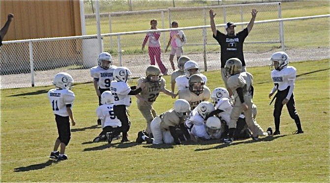 Image: Bantam wins on final play — With Dawson needing to run in an extra point to tie or pass for the win, the IYAA Bantam’s defense charges into the Bulldog backfield and noseguard Rocklin Ginnett recovers the resulting fumble to preserve the win for Italy.