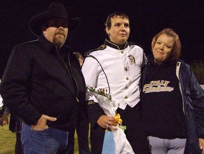 Image: Shane Cotter — Shane was escorted by his mom and dad.