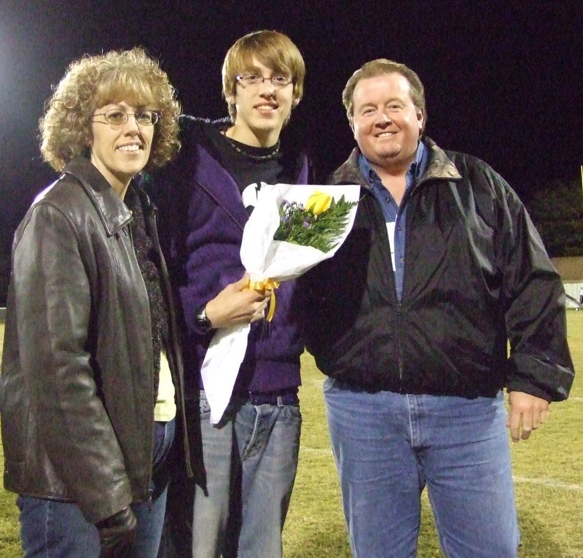 Image: Cory Hughes — Cory was escorted by his mom and dad.