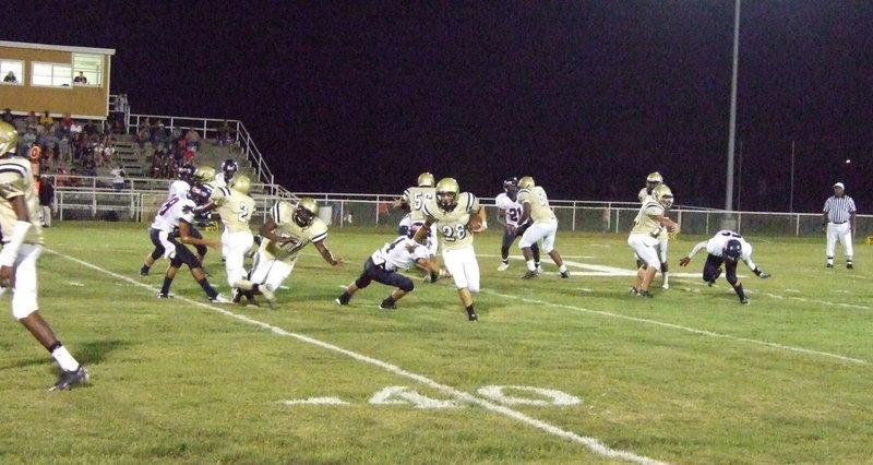 Image: “Thoroughbred” Jackson — Kyle Jackson (28) finds the running lane through the Mustang’s defense and races down the Gladiator sideline.