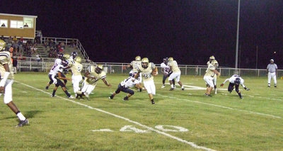 Image: “Thoroughbred” Jackson — Kyle Jackson (28) finds the running lane through the Mustang’s defense and races down the Gladiator sideline.