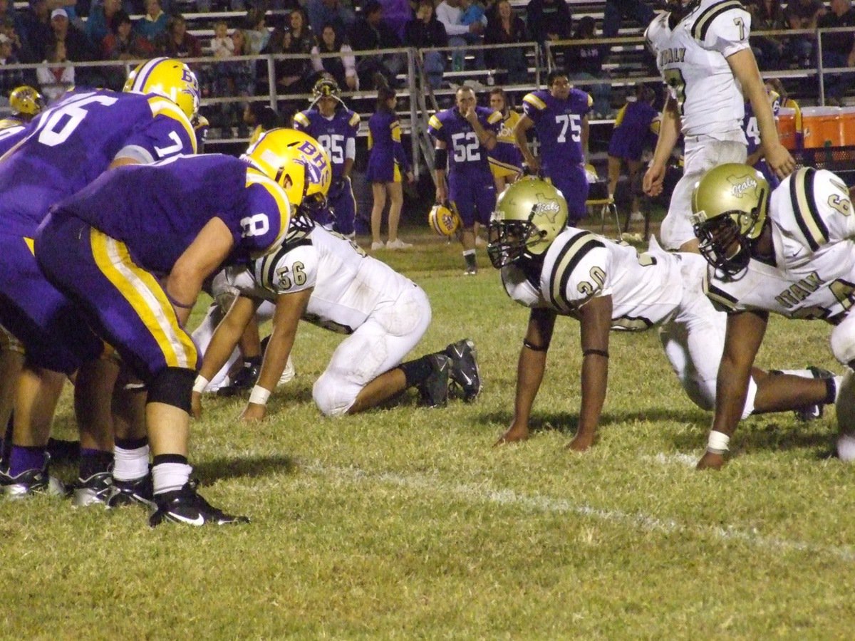 Image: Ready for the snap — Italy’s Omar Estrada(56), Jalarnce Jamal Lewis(30), Bobby Wilson(64) and Kyle Wilkins(7) zero in on the Bison offense.