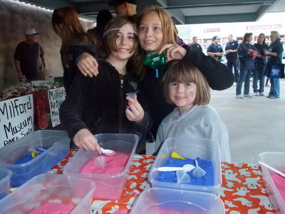 Image: Sand Bottle Fun — Shyanne Dorman, Miss Sanford and Harlie Dorman were all having fun making sand bottles.