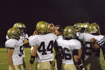 Image: Starting team — Gladiators huddle up to begin.