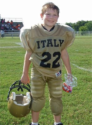 Image: Isaac Gray — Italy’s Isaac Gray is all smiles after playing the first game of his career.