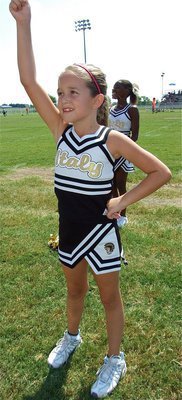 Image: Karley Nelson — Karley gets IYAA Gladiator fans pumped up during the game against Ferris.