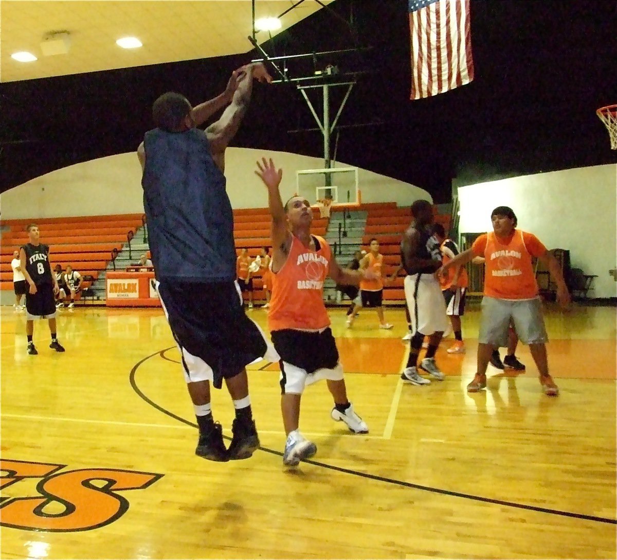 Image: Up and away — Italy’s De’Andre Sephus drops in a 3-pointer over an Avalon Eagle defender.