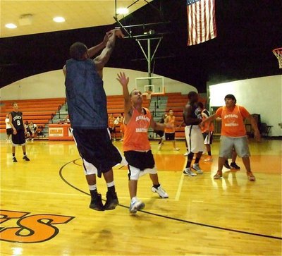 Image: Up and away — Italy’s De’Andre Sephus drops in a 3-pointer over an Avalon Eagle defender.