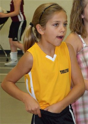 Image: Let’s do this — Haley Bowles has had enough pre-game discussion and gets ready to play some volleyball.