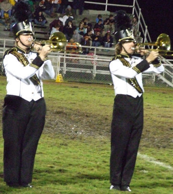 Image: Listen to the horns — During the halftime performance, the trumpets stand tall and proud.