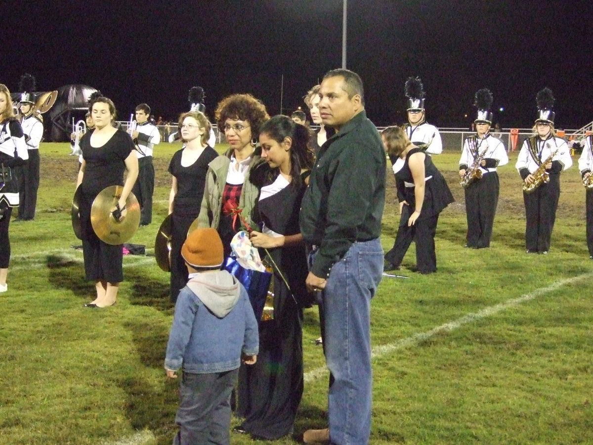 Image: Yesenia — Yesenia Sam and her family are ready for graduation.