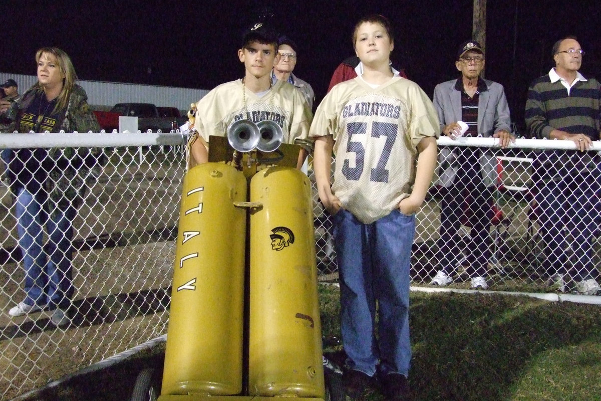 Image: Justin and Tristan — Justin and Tristan man the airhorn.