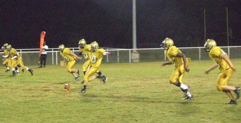 Image: Buchanan kicks — Justin Buchanan kicks off the game.