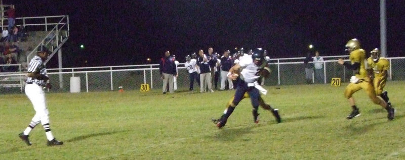 Image: Defense swarms the ball