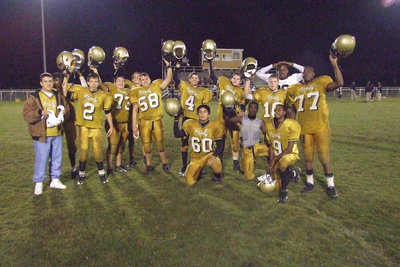 Image: The Dirty Dozen — The JV team nicknamed themselves the “dirty dozen” Thursday night.