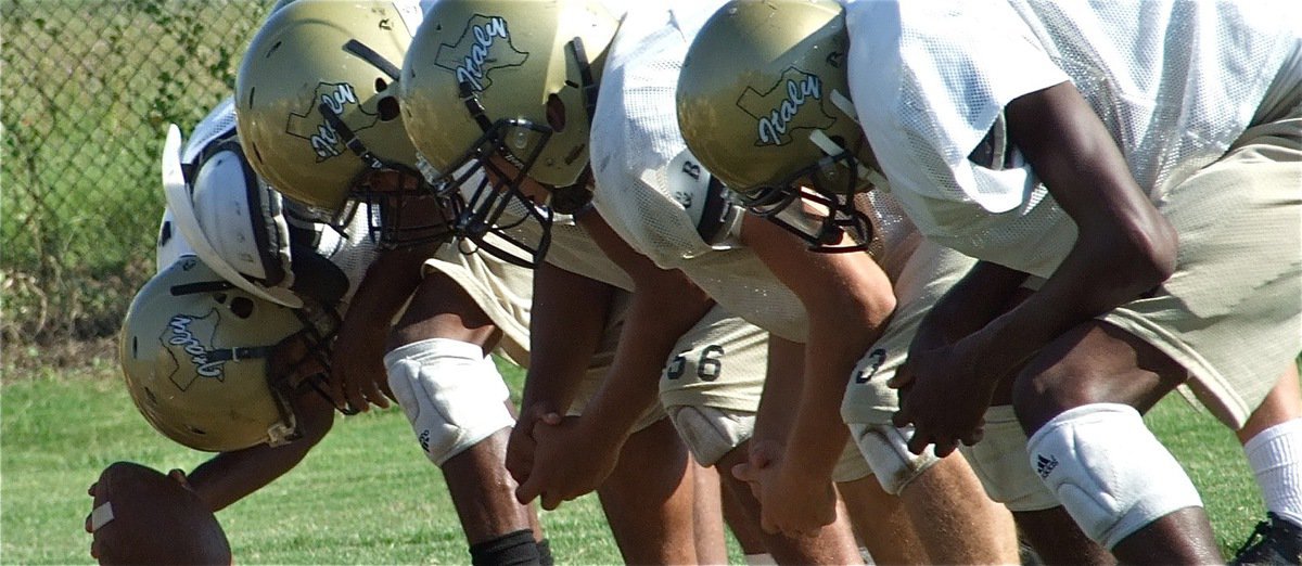 Image: The men up front — Snapper Ethan Simon, Omar Estrada, Brandon Souder and Devonta Simmons prepare to block as the Gladiators endure hard-hitting practices in preparation for Italy’s Homecoming game against the Hubbard Jaguars Friday, September 17, at Willis Field in Italy. Game time is 7:30 p.m.