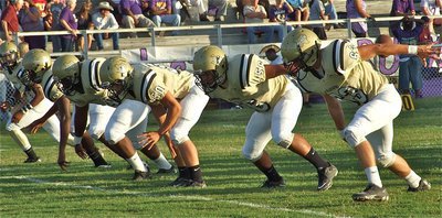 Image: Game time — Italy’s offensive line consisting of Larry Mayberry, Bobby Wilson, Ethan Simon, Omar Estrada and Brandon Souder fire off the ball during warmups.