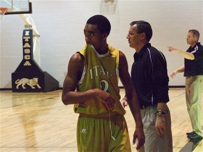 Image: Clemons and Coach — Like a pack of wild dogs, Heath Clemons(2) and the Italy Gladiators attacked the Itasca Wampus Cats from start to finish to become District Champions.
