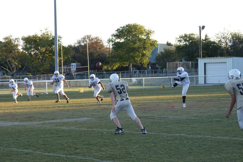 Image: Dawson kicks off — Italy receives the kickoff.