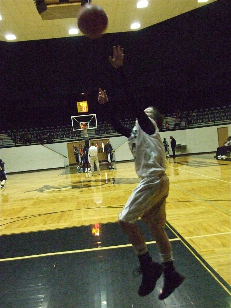 Image: J.T. warms up — J.T. Escamilla gets warmed up before the matchup with Dallas Life.