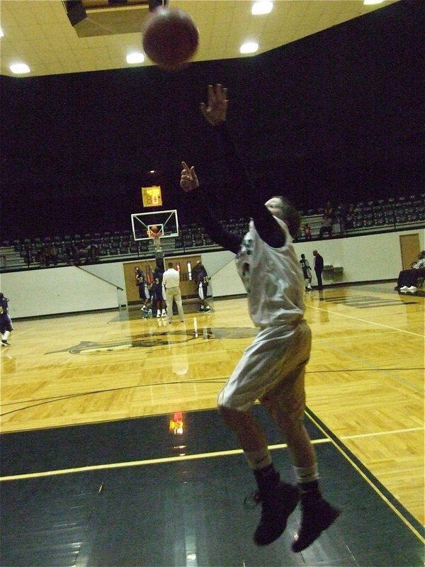 Image: J.T. warms up — J.T. Escamilla gets warmed up before the matchup with Dallas Life.