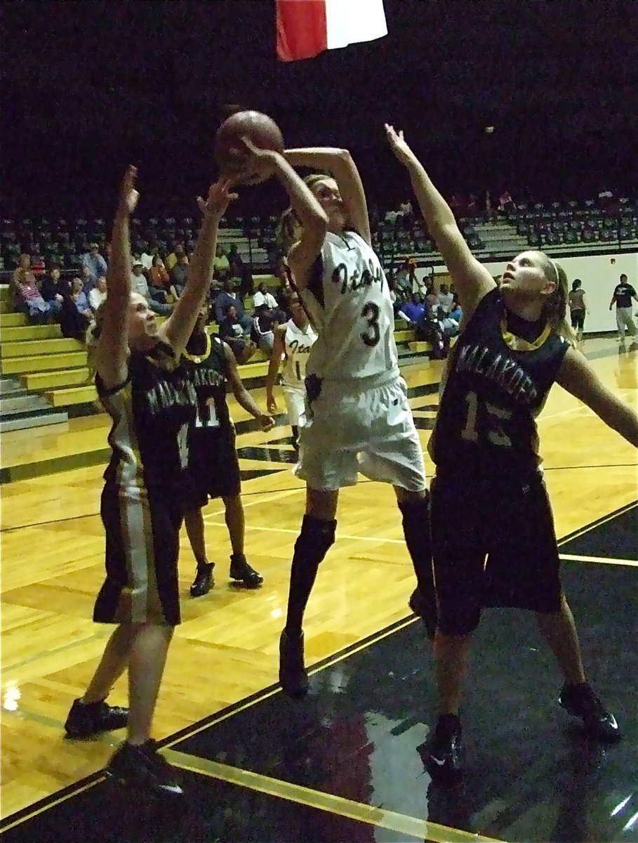 Image: Rossa on the boards — Kaitlyn Rossa(3) cannot be stopped in the paint.